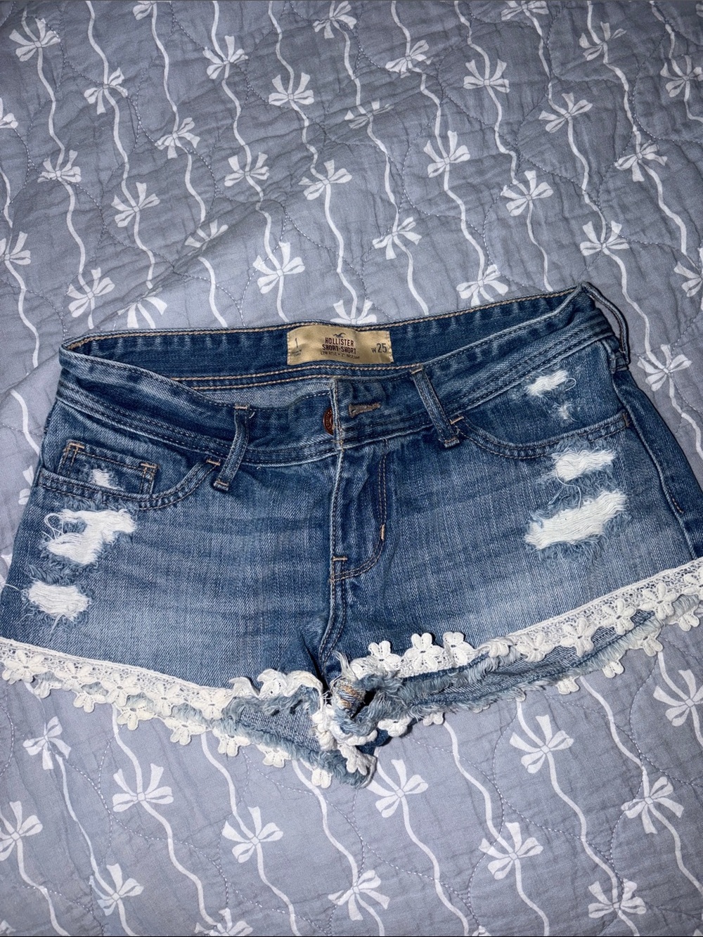 Hollister Faded Blue Distressed Denim Shorts with White Crochet Trim
